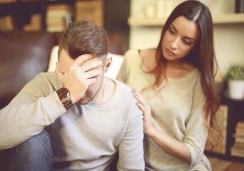 woman consoling man