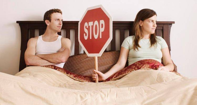 woman-showing-stop-to-man.jpg