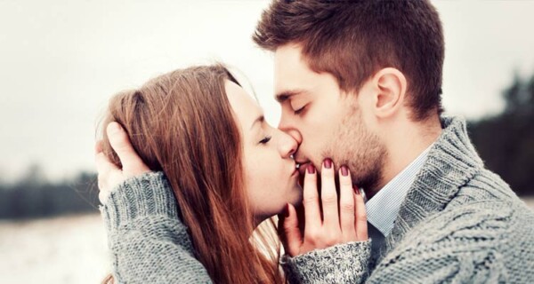 Kiss, love, romantic dating concept. Profile portrait of young