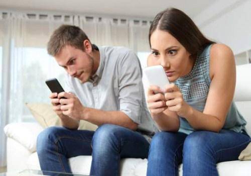 couple watching a phone