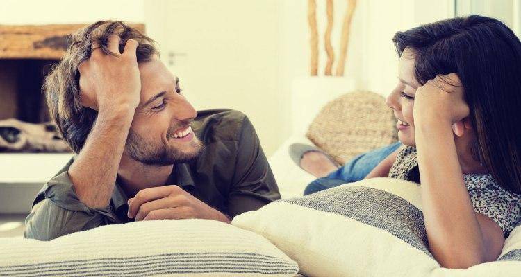 happy cute couple talking. There are romantic things to say to your husband to make him feel loved