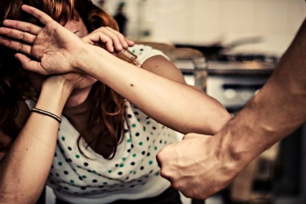man abusing woman