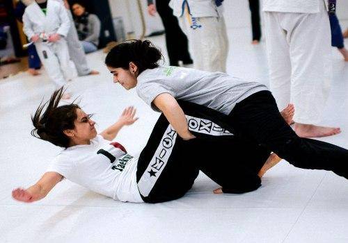 two woman learning karate