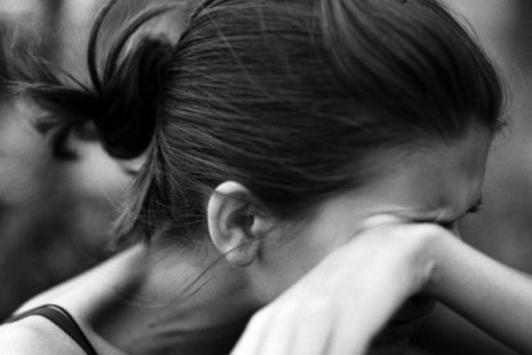 woman crying black and white image
