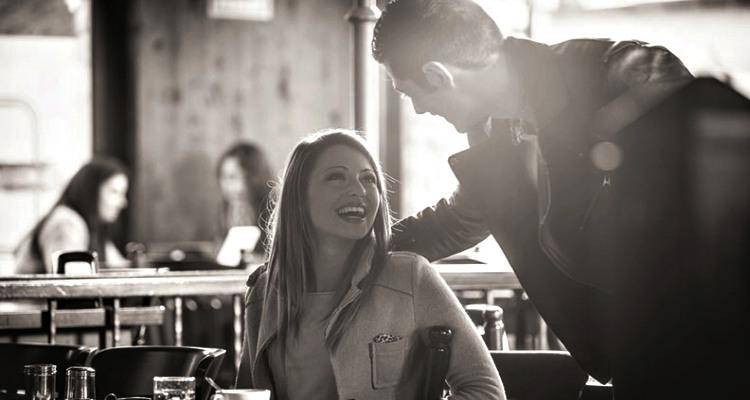 couple talking in black and white
