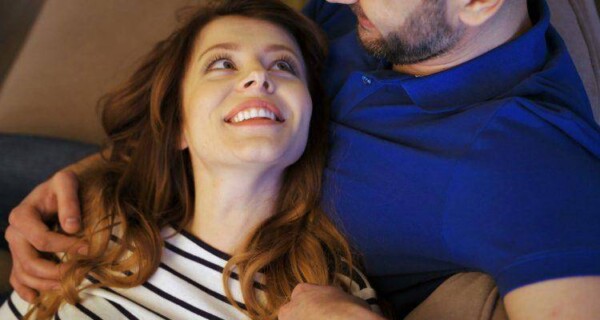 happy woman with her husband. There are romantic things that you can tell your husband to make him feel loved