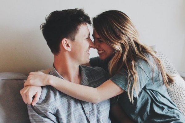 intimate couple laughing