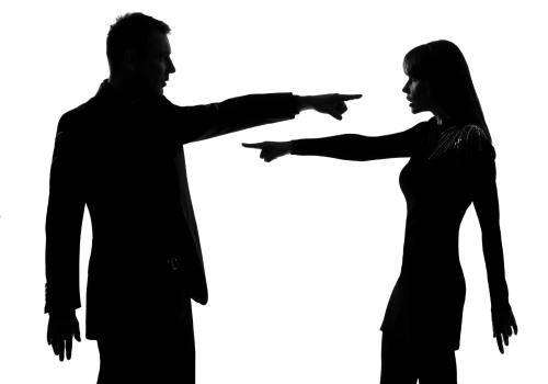 man and woman blaming each other