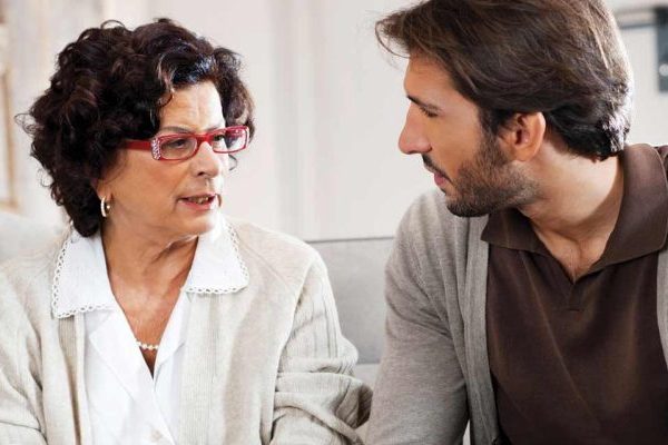 man talking with mother