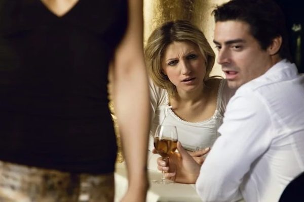 man watching woman