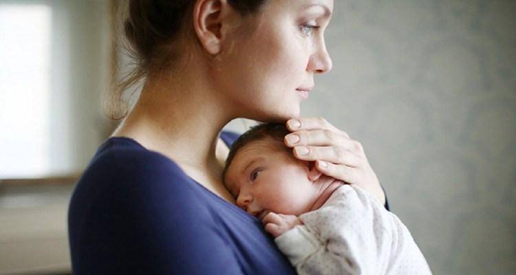 sad woman with child