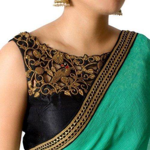 woman wearing zardozi work saree