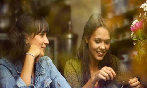 two woman talking