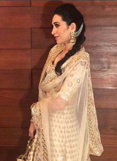 Karisma Kapoor in a heavily embroidered Manish Malhotra gold lehengha showed how to get the Big-Fat-Punjabi-wedding look right