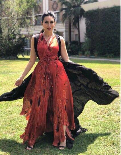 In a red Bohemian ensemble, with a black cape and a burn, Krishma Kapoor showed us how she slay just about everything