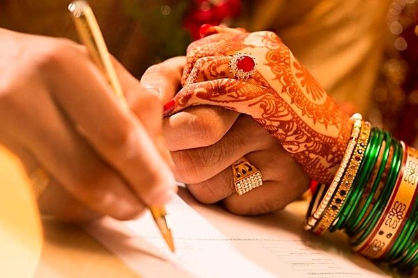 you can go for a court marriage in India or a Arya Samaj marriage