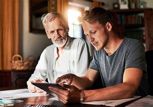 father discussing about some bills