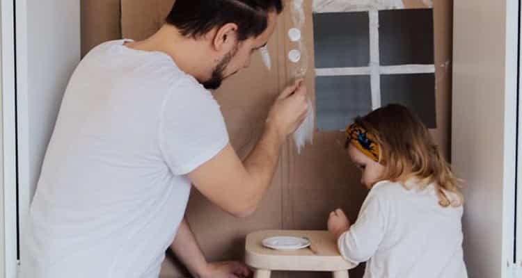 Man playing with child