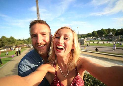 happy couple taking selfie