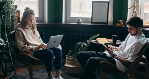 Couple working on laptop