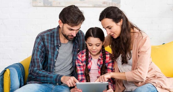 happy family browsing internet
