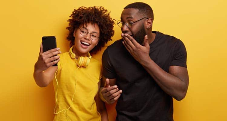 Happy couple taking selfie