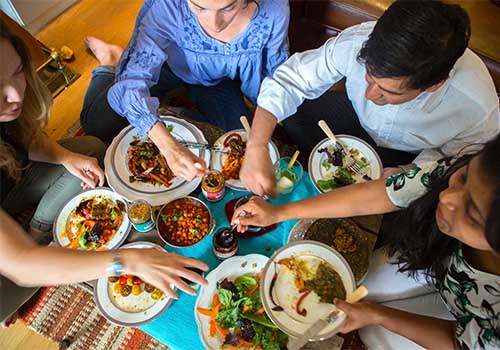 Friends eating together