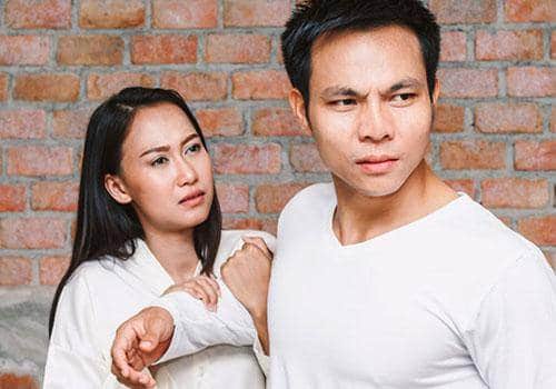 man pushing girl hard