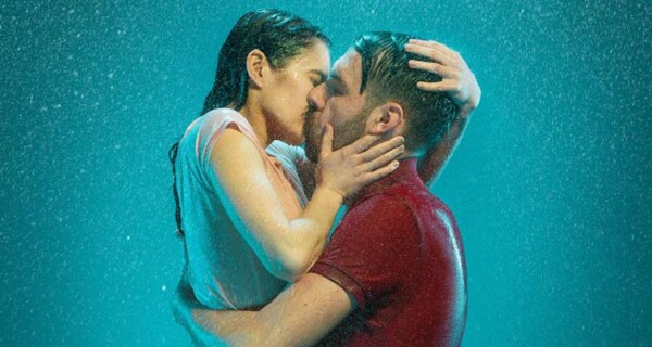 couple kissing in rain