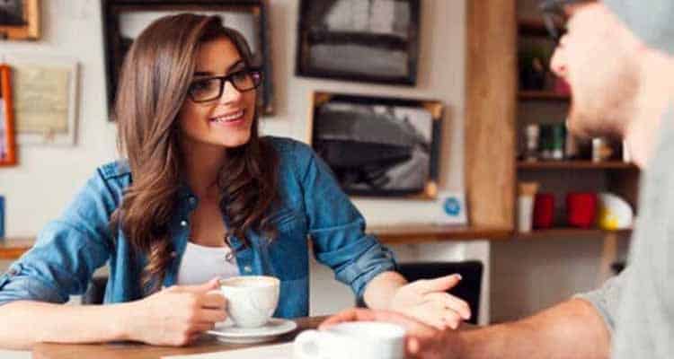 Couple talking at cafe