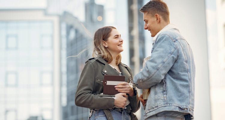 man shows respect to a woman