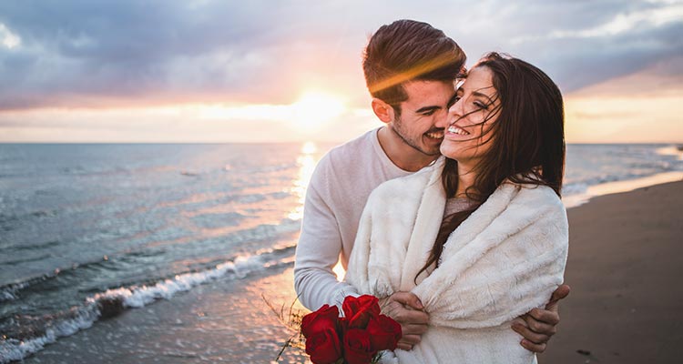 Line-in partners enjoying on beach