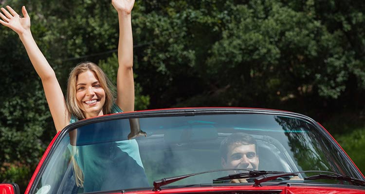 Couple enjoying long drive