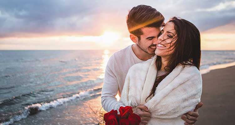 Happy couple near beach