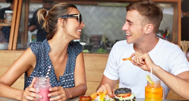 couple smiling and talking