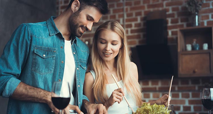 man women cooking