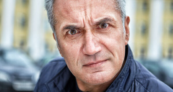well-groomed-man-with-appearance-official-angry-reproachful-look-with-irritation-looks-into-photographers