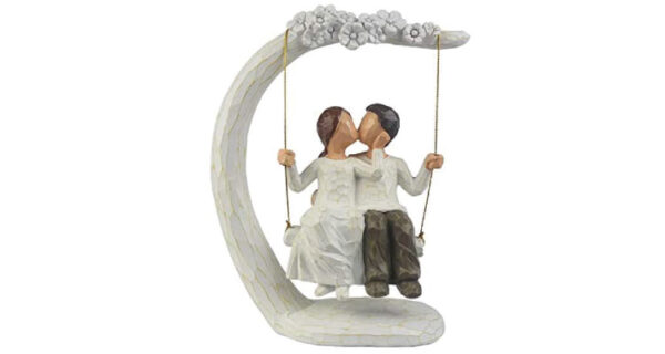 first wedding anniversary gift: Kissing couple figurine