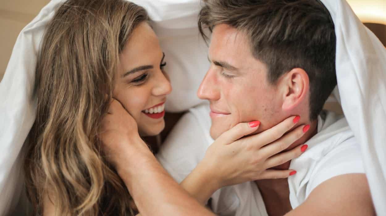 signs a woman is sexually attracted to you